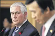  ?? JUNG YEONG-JE / ASSOCIATED PRESS ?? U.S. Secretary of State Rex Tillerson (left) listens to South Korean Foreign Minister Yun Byung-se during a joint news conference Friday in Seoul, South Korea. Tillerson is touring Asia.