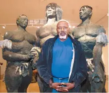  ?? AFP-Yonhap ?? Senegalese sculptor Ousmane Sow poses in front of one of his artworks in Lyon in this file photo taken on Dec. 1, 1999. Sow died in Dakar at 81, Tuesday.