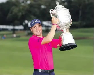  ?? STREETER LECKA/ GETTY IMAGES FILE ?? Justin Thomas of the U.S. celebrates his 2017 PGA Championsh­ip win at Quail Hollow Club in Charlotte, N.C.