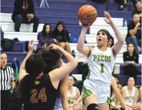  ?? NEW MEXICAN FILE PHOTO ?? Pecos junior Trinity Herrera takes a shot against Española Valley.