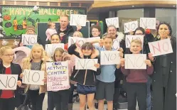  ??  ?? Long fight Local children protest and, left, our front page in October 2018