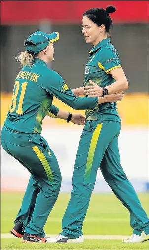  ?? Picture: GETTY IMAGES ?? WELL DONE: Eastern Province cricketers Dane van Niekerk, left, and Marizanne Kapp took four wickets each as South Africa whipped the West Indies in their ICC Women’s World Cup match at Grace Road, Leicester, yesterday