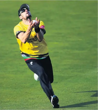  ??  ?? Benny Howell takes a fine catch to dismiss Jason Roy