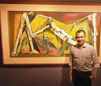  ??  ?? Leon Gallery owner Jaime Ponce de Leon by “Fishermen” by Ang Kiukok