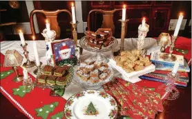  ??  ?? Cookies ( from lef t) Viennese Marzipan Bars, Palm Beach Brownies ( center top), California Fruit Bars ( center bottom) and Brittle Peanut Bars.