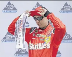  ?? DARRON CUMMINGS/ASSOCIATED PRESS ?? Kyle Busch won the pole for today’s Brickyard 400, turning a lap of 184.634 mph in the third and final round of qualifying Saturday in Indianapol­is.