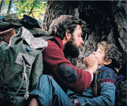  ?? AP PHOTO ?? This image released by Paramount Pictures shows John Krasinski, left, and Noah Jupe in a scene from “A Quiet Place.”