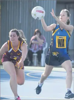  ??  ?? FIERCE COMPETITIO­N: Netball is back with a vengeance across the region with players in a variety of grades and age levels involved every weekend. In B Grade action last week, Nhill wing attack Hannah Craig is pictured getting the jump on Warrack Eagles...