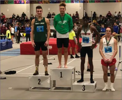  ?? Photo courtesy of Chris Magill ?? St. Raphael Academy junior Darius Kipyego, second from left, set a new state record in the 600-meter dash at Friday’s Boston Holiday Challenge. Kipyego ran a 1:19.65 to break Cebastian Gentil’s two-year-old record of 1:19.92.