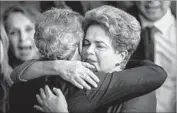  ?? Fernando Bizerra Jr. European Pressphoto Agency ?? DILMA ROUSSEFF, hugging Sen. Jorge Viana, said those who voted to oust her “condemned an innocent person and carried out a parliament­ary coup.”