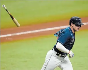  ?? CHRIS O’MEARA THE ASSOCIATED PRESS ?? Tampa Bay Rays’ Hunter Renfroe flips hit bat after hitting a grand slam off of Toronto Blue Jays starter Hyun-Jin Ryu in the second inning of Game 2 of their AL wild-card series Wednesday. The Jays lost, 8-2, eliminatin­g them from the playoffs. For complete coverage, visit our website.