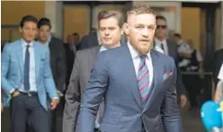  ?? BARRY WILLIAMS ?? Conor McGregor leaves court Thursday after plea in Barclays melee.