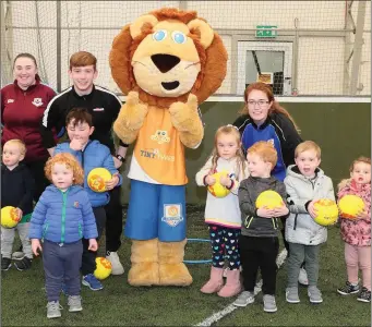  ??  ?? Lenny the Lion with some of the little footballer­s as Little Tykes Soccer Series kicked off at Drogheda Leisure Park