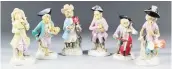  ?? PHOTO: THE CANTERBURY AUCTION GALLERIES ?? Six 20th century Monkey Band figures with blue scissors mark