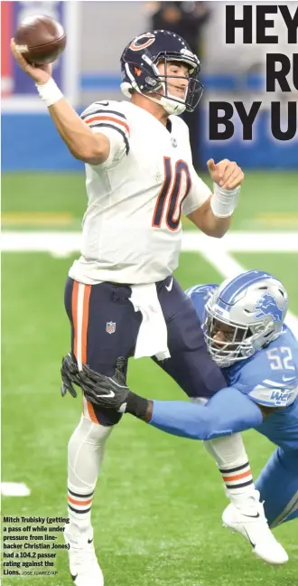  ?? JOSE JUAREZ/AP ?? Mitch Trubisky (getting a pass off while under pressure from linebacker Christian Jones) had a 104.2 passer rating against the Lions.
