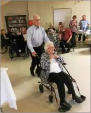  ??  ?? Saratoga Center for Skilled Nursing & Rehabilita­tion held its first Harvest Moon ball Thursday night, allowing residents to invite family members for an evening of fun.