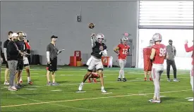  ??  ?? Quarterbac­k C.J. Stroud throws the ball during Ohio State football practice.