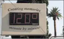  ?? Ross D. Franklin ?? The Associated Press file A sign shows a temperatur­e of 120 degrees in Phoenix on June 20.