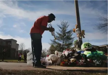  ?? GETTY IMAGES ?? Ferguson residents had complained of a motorist driving through a memorial to slain teen Michael Brown.