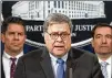  ?? J. SCOTT APPLEWHITE / AP ?? Attorney General William Barr, flanked by FBI Deputy Director David Bowdich (left) and other officials, said Monday the shooting at Naval Air Station Pensacola was ruled an act of terrorism.