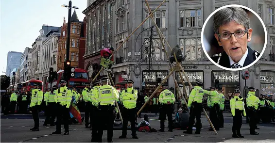  ?? Pictures: GETTY, PA,LNP ?? A third of the Met’s bobbies – around 8,000 officers – were needed to police the demonstrat­ions which resulted in travel chaos across the capital