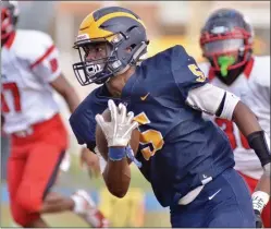  ?? KYLE FRANKO — TRENTONIAN PHOTO ?? Nottingham’s Marc Kauffman carries the ball against Trenton. The Northstars won, 24-0, to improve their playoff standing.