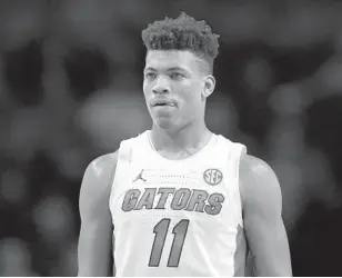  ?? MATT STAMEY AP ?? Florida forward Keyontae Johnson, the SEC preseason player of the year, collapsed on the court against Florida State and was taken to a hospital, where he was in critical condition.