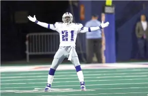  ?? Rodger Mallison/Fort Worth Star-Telegram/TNS ?? Dallas Cowboys return man Deion Sanders taunts the crowd after a punt by Brad Maynard of the New York Giants went out of bounds on Monday, Oct. 18, 1999 in East Rutherford, New Jersey.