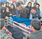  ??  ?? As rescuers search for survivors in the rubble of a building in Sarpol-e-zahab in western Iran, right, one victim is mourned in the city, left. The quake’s epicentre was in the Iran-iraq border region, below