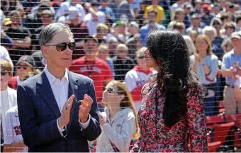  ?? STuART CAHiLL / HERALD sTAff fiLE ?? PICKING FAVORITES? AG Maura Healey, right, allowed Red Sox owner John Henry, seen above with his wife, Linda, to go cash-free at Fenway Park.