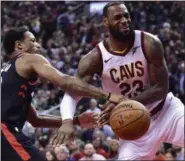  ?? FRANK GUNN — THE CANADIAN PRESS VIA AP ?? LeBron James reacts after being fouled by Raptors guard DeMar DeRozan during the second half on Jan. 11 in Toronto.