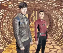  ?? Syfy ?? CAMERON CUFFE portrays Seg-El, the grandfathe­r of Superman, who is having a secret affair with Lyta-Zod, played by Georgina Campbell, in Syfy’s “Krypton.”