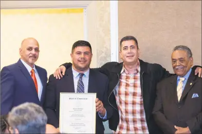  ?? Contribute­d photo ?? At far left, Asher Delerme, executive director of the Chemical Abuse Services Agency, or CASA, in Bridgeport, celebrates the organizati­on's 30th anniversar­y alongside, from left, state Rep. Christophe­r Rosario, state Rep. Ezequiel Santiago and state Sen. Ed Gomes.