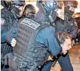  ?? ?? Videos have been circulatin­g online of protesters being arrested by police