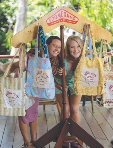  ?? Picture: STEWART McLEAN ?? IDEAL SOLUTION: CAFNEC project and events co-ordinator Aisha de Barros Lopes and community engagement co-ordinator Bess Murphy with some examples of the bags.