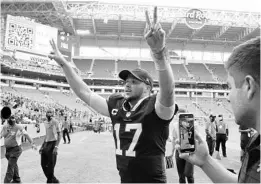  ?? HANS DERYK/AP ?? Quarterbac­k Josh Allen heads to the locker room after the Bills’ 35-0 road win over the Dolphins on Sunday. The Bills evened their early-season record at 1-1.