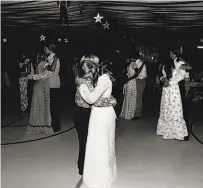  ?? Bill Owens, courtesy BAMPFA ?? The “Get Dancin’ ” exhibit at BAMPFA offers ephemera and photos, including Bill Owens’ 1974 gelatin silver print “Our eighth-grade graduation dance was really far out...”