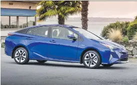  ?? PHOTOS COURTESY OF TOYOTA CANADA ?? Since introducin­g the Prius in 1997, Toyota has sold more than nine million hybrid vehicles worldwide, including this 2017 Prius Touring model.