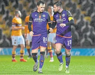  ??  ?? Lawrence Shankland with Calum Butcher after United pulled a goal back.