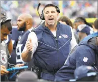  ?? James Kenney / Associated Press ?? Titans coach Mike Vrabel won three Super Bowl rings playing linebacker and goal-line pass threat for Bill Belichick in New England. Now the rookie head coach gets his first crack at his former coach when Vrabel’s Titans host former teammate Tom Brady and the Patriots in a game Tennessee desperatel­y needs.