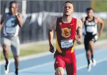  ?? ALEX GALLARDO/ THE CANADIAN PRESS ?? USC’s Andre De Grasse wins the 200-metre race against Terrance Chambers, left, and Jaysean Skrine, right, in the Pac 12 track and field competitio­n in L.A. on May 16.