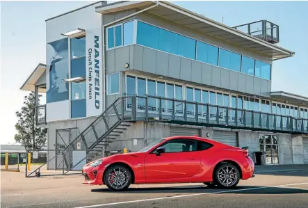  ??  ?? The Chris Amon Edition Toyota GT86 parked at something else that carries the great racing driver’s name, Manfeild’s Circuit Chris Amon.