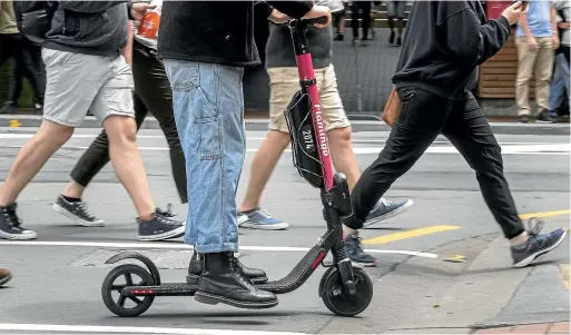  ?? KEVIN STENT/STUFF ?? E-scooters are not mentioned in the proposal to lower speed limits to 30kmh in the CBD.