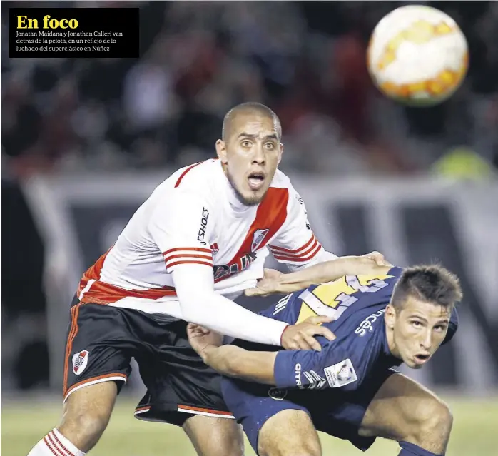  ?? Fabián marelli ?? En foco Jonatan Maidana y Jonathan Calleri van detrás de la pelota, en un reflejo de lo luchado del superclási­co en Núñez