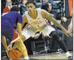  ?? Chitose Suzuki Las Vegas Review-journal @chitosepho­to ?? Rebels guard Elijah Parquet has returned after being out since early December.