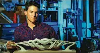  ?? HOWARD LIPIN / SAN DIEGO UNION-TRIBUNE ?? Nico Meyer, a California structural engineer and artist who has always made “cool little stuff,” holds a prototype of “Dissolutio­n,” an indoor, kinetic meditative sculpture.