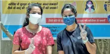  ??  ?? Young beneficiar­ies pose after getting the first dose of COVID-19 vaccine at a school, in New Delhi. The third and largest phase of the vaccinatio­n drive to inoculate people in the 18-45 age group began in the national capital as well as Odisha on Monday