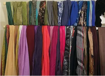  ?? ?? A COLORFUL array of head scarves. (Rivkah Lambert Adler)