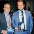  ??  ?? ABOVE Bill Coppins (left) and operations manager Ryan Coppins with the Green Award.