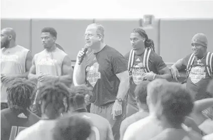  ?? MICHAEL LAUGHLIN / SOUTH FLORIDA SUN SENTINEL ?? UM great Gino Torretta speaks at the 2019 Paradise Camp at the Carol Soffer Indoor Practice Facility.